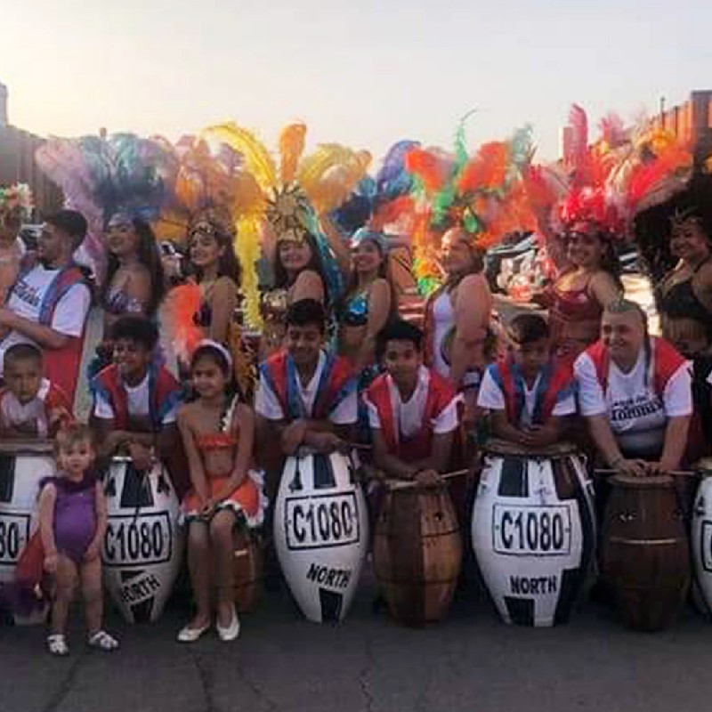 An image of a large group of people with Candombe Drummers