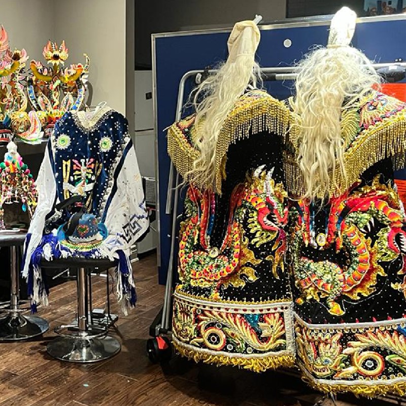 An image of different costumes from the Diablada Carnival